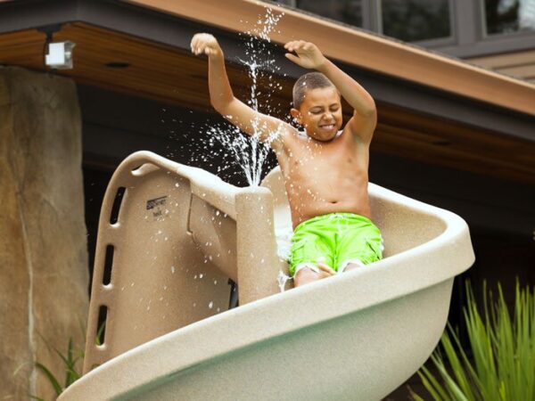 Boy in HeliX Pool Slide - Aquachem