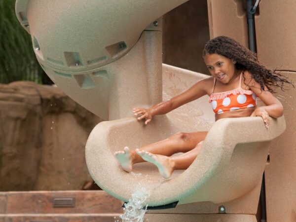 Girl in HeliX Pool Slide - Aquachem